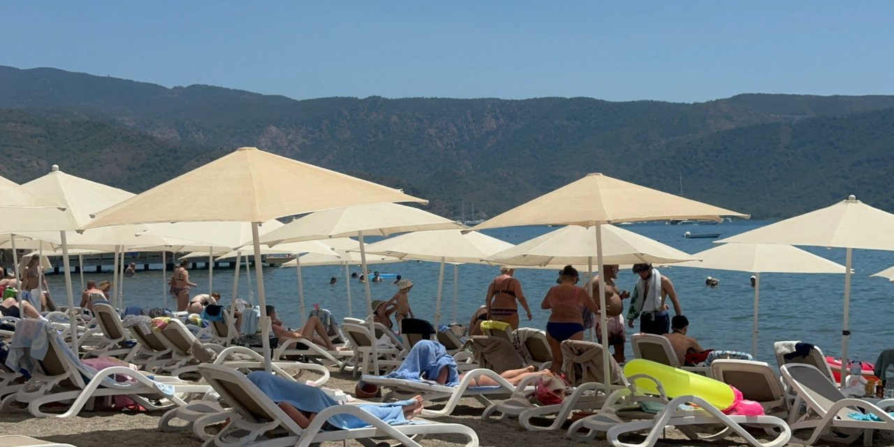 Marmaris’te kavurucu sıcaklar denize koşturdu