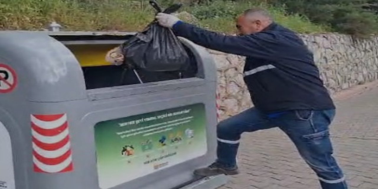 Marmaris’te temizlik işçisinden “Çöp böyle atılır” mesajı