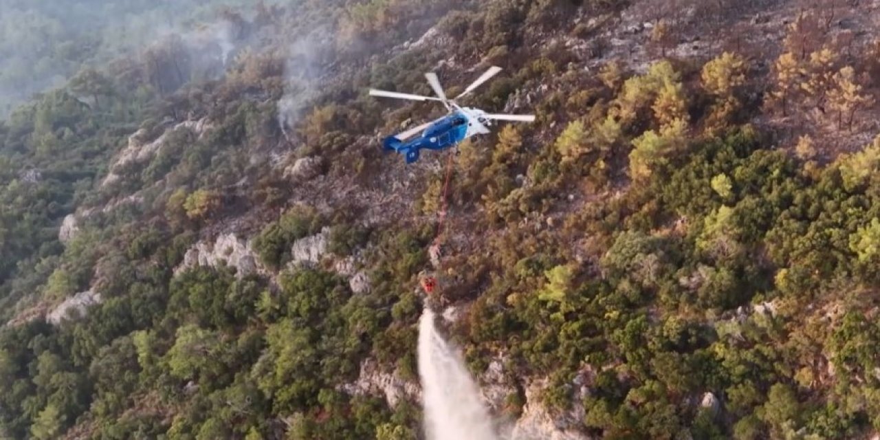 Fethiye’de ekiplerin orman yangını ile ilgili mücadelesi sürüyor